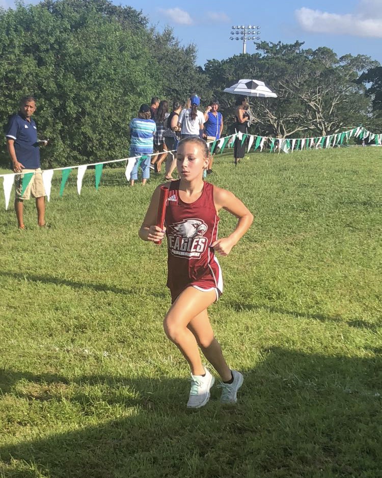 Greenwald is pictured running for MSD at one of her meets.
