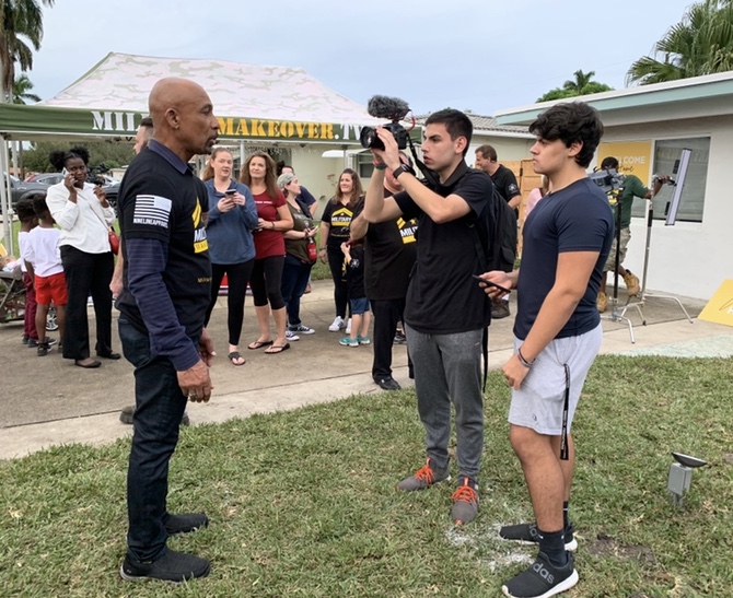 Riemer interviews Montel Williams on the set of "Military Makeover," a Lifetime show where veteran homes are improved.