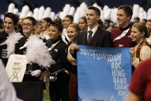 The MSD Eagle Regiment celebrates winning second place after their performance. Photo by Liam Hutton.