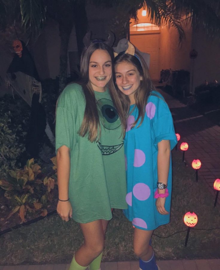 Sophomores Jenna Weissman and Helena Denny pose for a picture in their Halloween costumes. They dressed up as Mike and Sully from Monsters inc. 