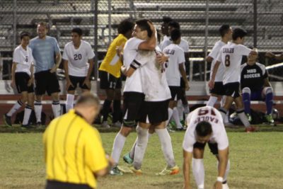 Senior captains Casey Conn and Felipe Mendes embrace after their season-opening 2-1 victory against rival Boca Raton. (Photo Courtesy of Casey Conn)