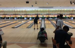 Senior Devon Weisenfeld looks on as he bowls for a strike. Photo courtesy of Richard Doan