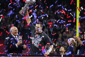 New England Patriots quarterback Tom Brady (12) holds up the Vince Lombardi Trophy during the post-game ceremony for Super Bowl LI after the New England Patriots defeated the Atlanta Falcons 34-28 in overtime on Sunday, Feb. 5, 2017 at NRG Stadium in Houston, Texas. (Anthony Behar/Sipa USA/TNS)