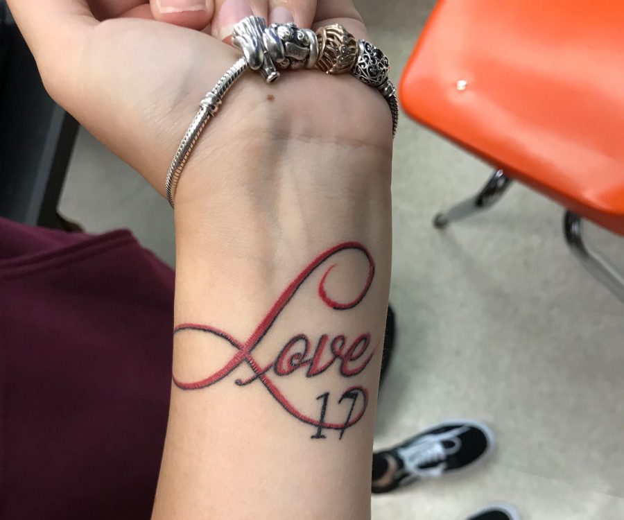 Students get tattoos to honor the 17 victims