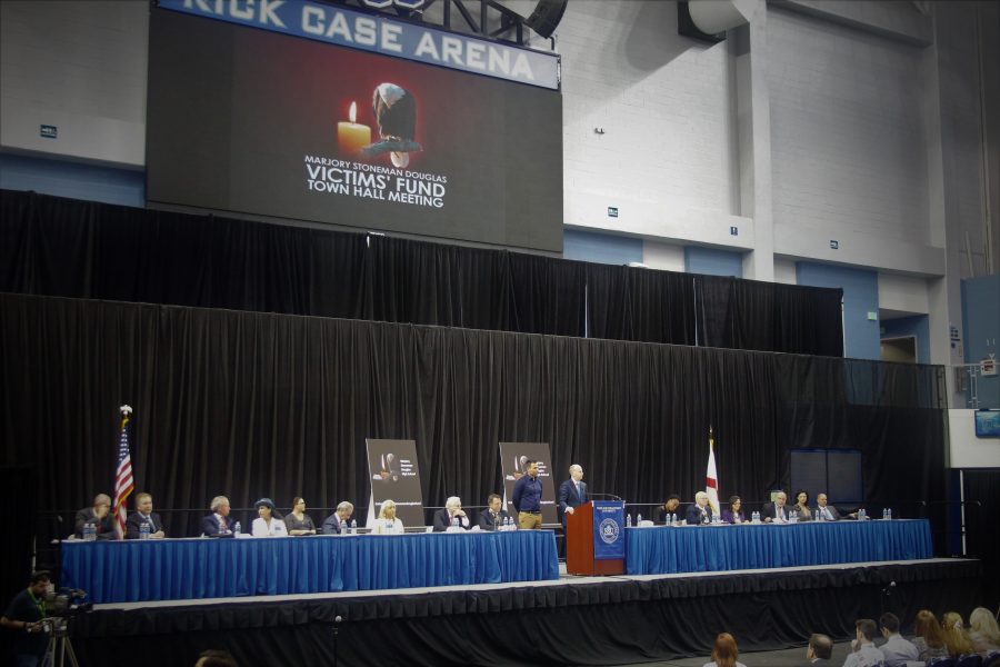 The community meets in Rick Case Arena at Nova Southeastern University in Davie to decide how to appropriate the funds of the MSD Victims Fund. Photo by Ryan Lofurno.