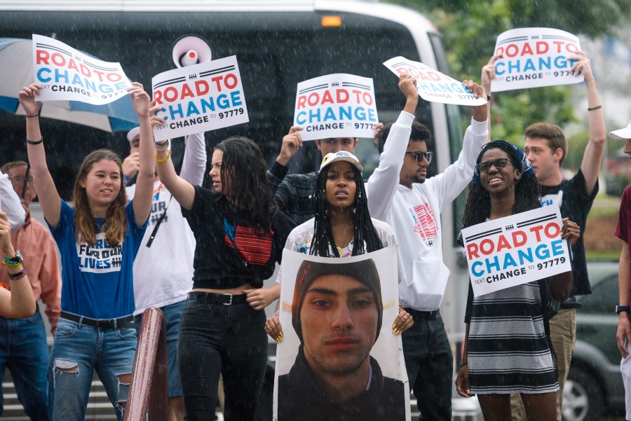 Protest+for+Change.+Seniors+Sarah+Chadwick++and+Kirsten+McConnell+and+alumna+Tyra+Hemans+protest+in+front+of+the+Alabama+State+Courthouse+for+common+sense+gun+laws.+Photo+courtesy+of+Emilee+McGovern