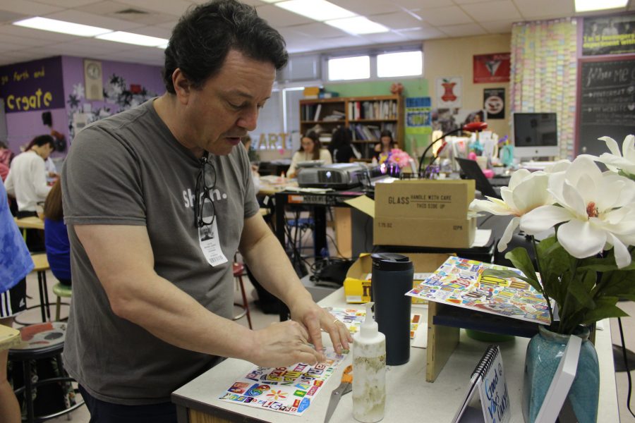 Michael Albert shows MSD art students how to collage. Photo by Fallon Trachtman