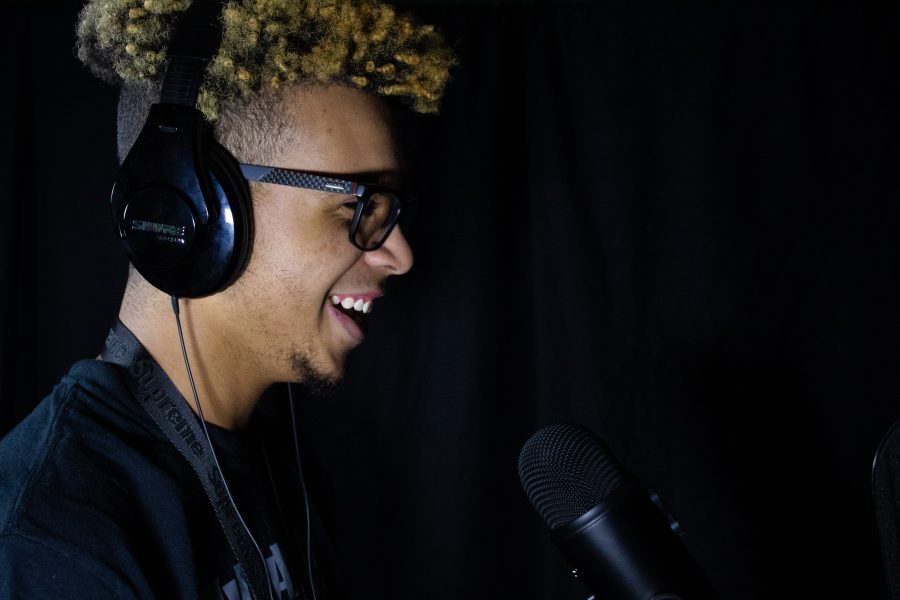 Junior Austin Roy freestyles rap songs for his Soundcloud account. Portrait by Nyan Clarke