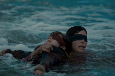 Julian Edwards and Sandra Bullock in Bird Box. (Saeed Adyani/Netflix/TNS)