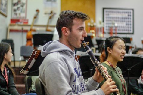 Senior Cameron Leonardi practices his clarinet, in hopes of pursuing music professionally. Leonardi started playing instruments in middle school and has continued in high school, competing in county and state competitions. Photo Illustration by Nyan Clarke