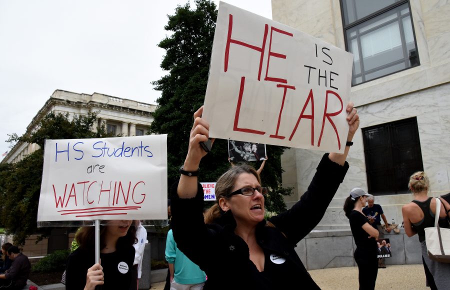 Demonstrators opposed to Supreme Court nominee Brett Kavanaugh protest inside the Hart building on Capitol Hill in Washington, D.C.,  on Sept. 27, 2018. Photo courtesy of Olivier Douliery/Abaca Press/TNS