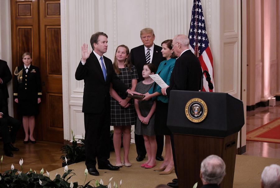  Retired Justice Anthony Kennedy, administers the judicial oath to Judge Brett Kavanaugh on Monday, Oct. 8. Photo courtesy of Olivier  Douliery/Abaca Press/TNS