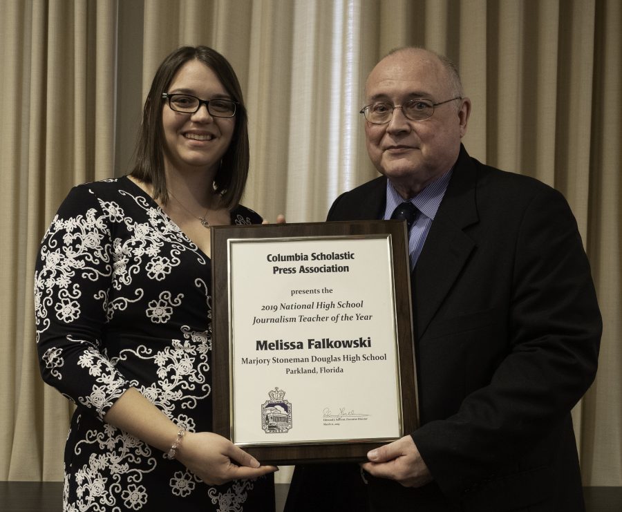 Newspaper adviser Melissa Falkowski accepts her Teacher of the Year Award at CSPA at an advisers luncheon on Photo courtesy of Mark Murray