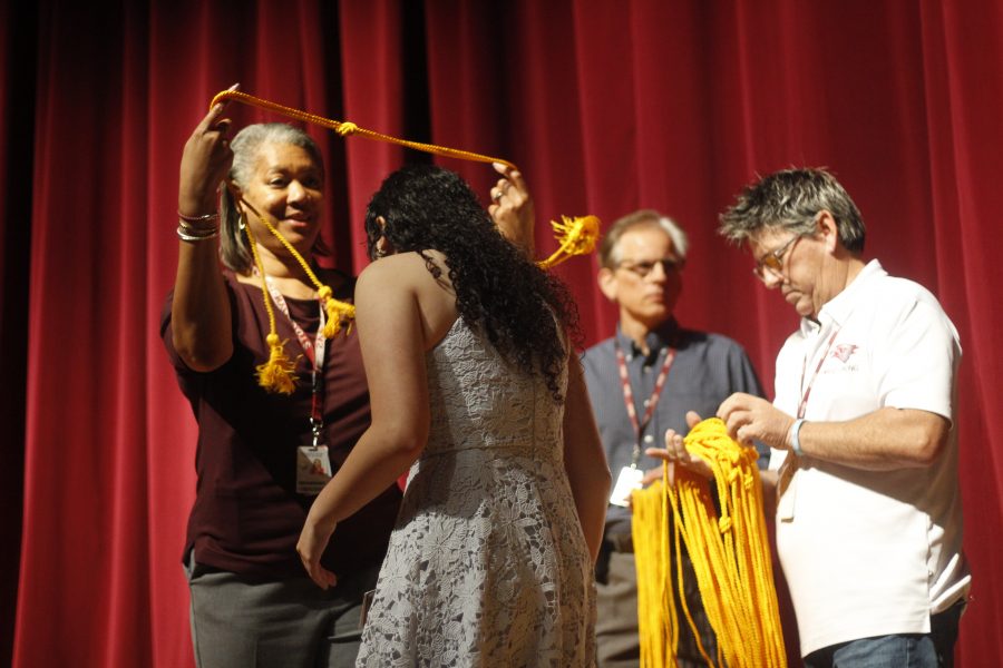 Principal+Hall+presents+graduating+class+with+cords+for+upcoming+graduation.+Photo+by+Kaleela+Rosenthal++
