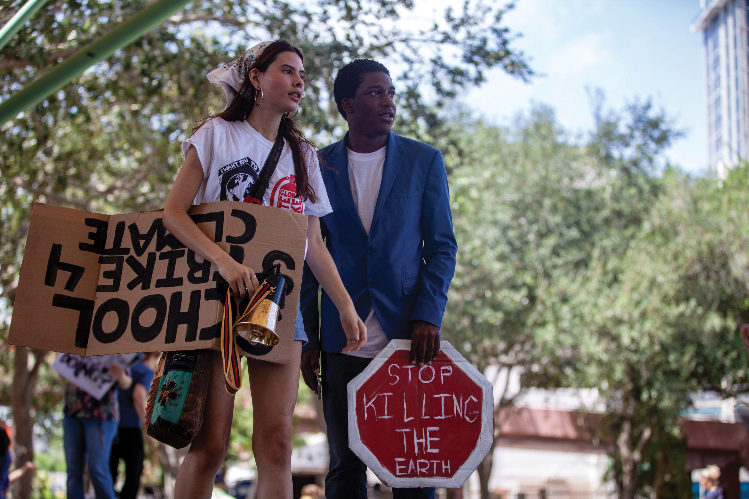 Searching for Change. Cypress Bay High School student activist Martina Velásquez and Broward County Human Relations Committee representative Elijah Manley oversee the Fort Lauderdale climate change protest, which they organized. Photo by Darian Williams
