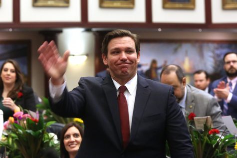 Florida Governor Ron DeSantis waves to members of the Florida Legislature during a joint session of lawmakers, Tuesday, January 14, 2020 in Tallahassee.