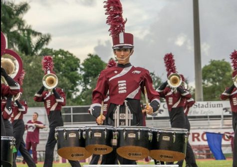Student musician Asher Perez performs in the 2018-2019 Eagle Regiment marching band show “Beyond.”