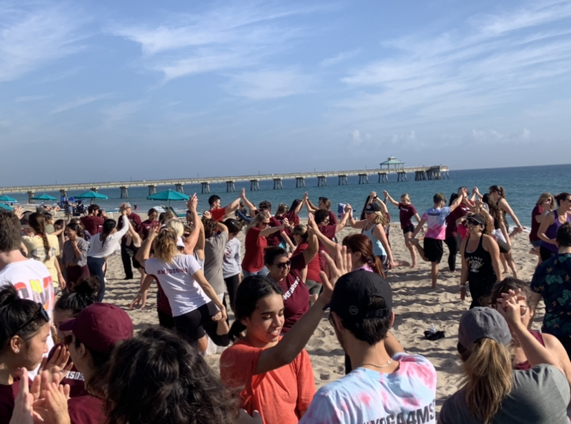 MSD students partner pose during Amy Kenny's yoga session