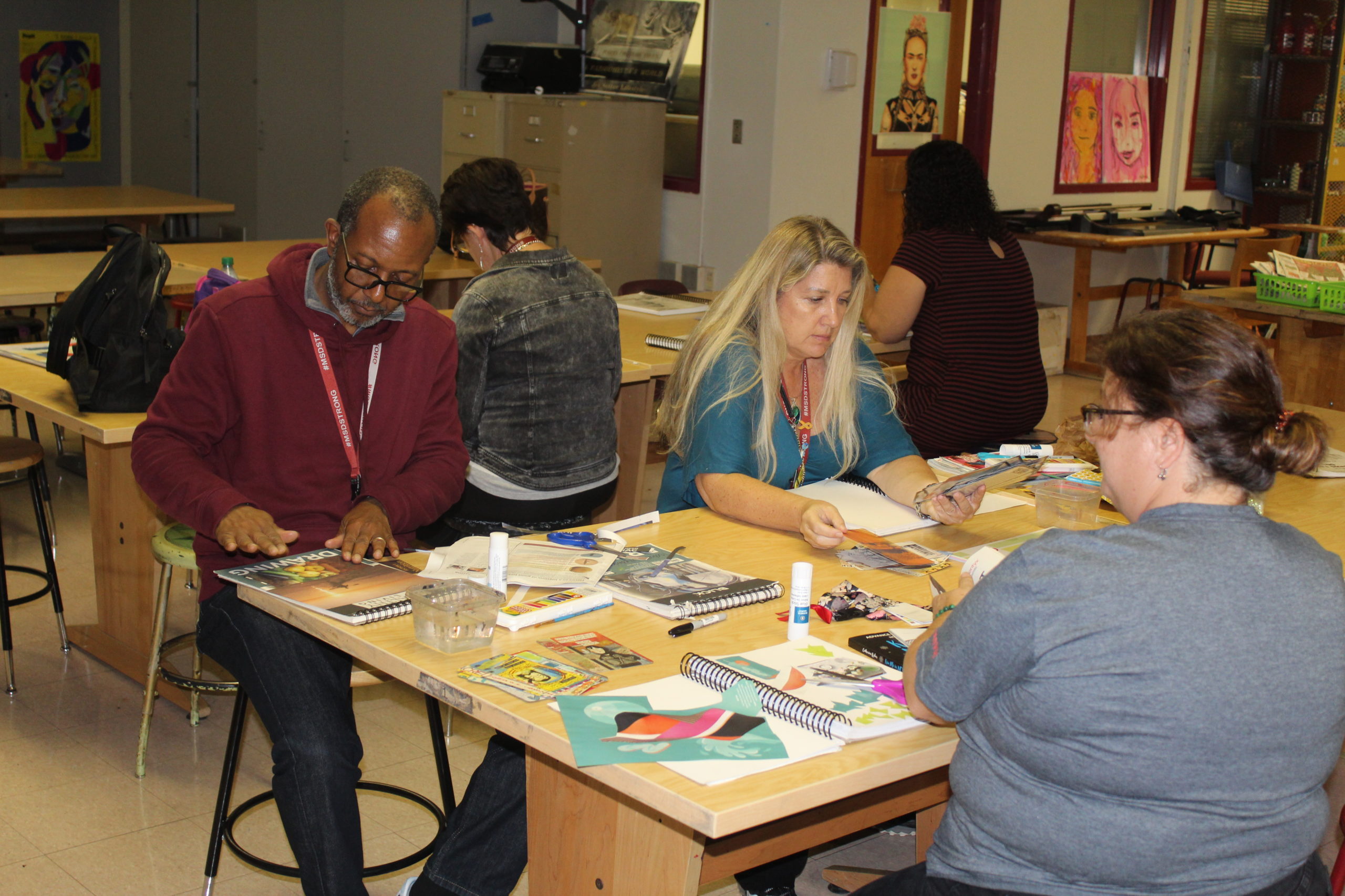 French teacher Geemps St. Julien and ESE Specialist Joanne Wallace participate in the first teacher art class hosted by Randee Lombard. Photo by Avery Stout