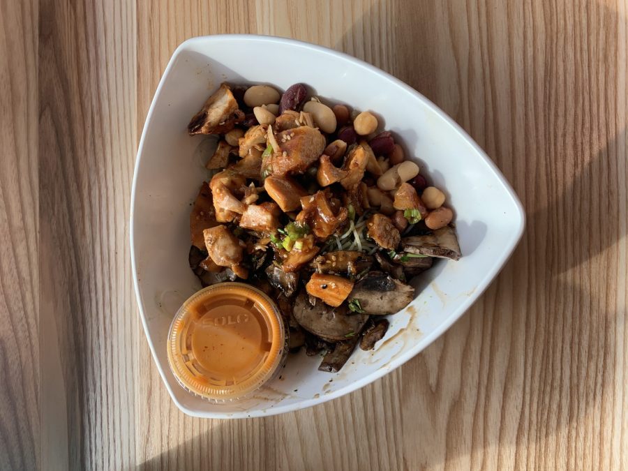 Here is one of their bowls available for purchase. This includes the cilantro noodles, power beans, balsamic mushrooms, Teriyaki chicken, and the spicy thai sauce. Photo by Delaney Walker.