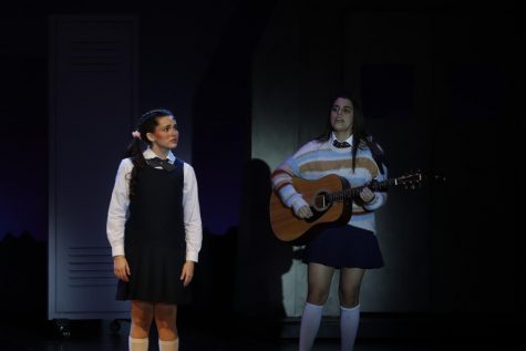 Harris as female lead Alice in "Imaginary: A New Musical" with senior Andrea Peña on guitar. Photo by Sam Grizelj