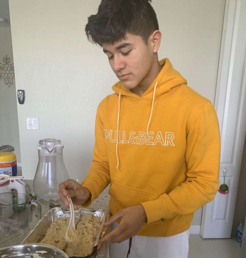Sophomore Steven Trejos is pictured baking, a hobby he picked up over quarantine.