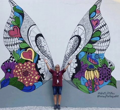 Peer counseling teacher Laura Rountree poses in front of the butterfly mural at Marjory Stoneman Douglas High School. Photo courtesy of Laura Rountree