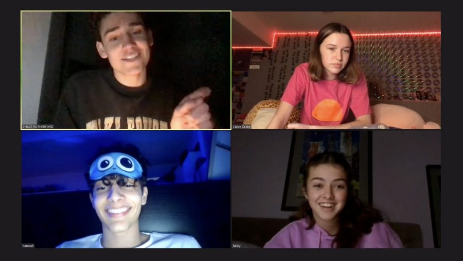 Were+Live.+Hamzah%2C+Haley+Sharpe%2C+and+Claire+Drake+laugh+while+Chase+Rutherford+makes+jokes+during+4freakshows+sleepover+live+stream.+Photo+by+Sophia+Squiccirini+