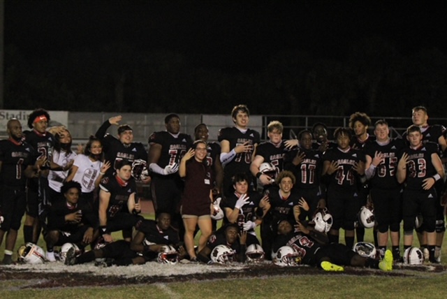 The Eagles gather on the 50-yard line after the game to celebrate their victory. Photo courtesy of Kelsie Yon