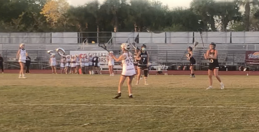 Playing it safe. Eagles attack Stephanie Bilsky (25) sends a short pass back to keep the ball away from defenders. Bilsky and many other Eagles attackers contributed in the teams 19-4 win against Spanish River.
