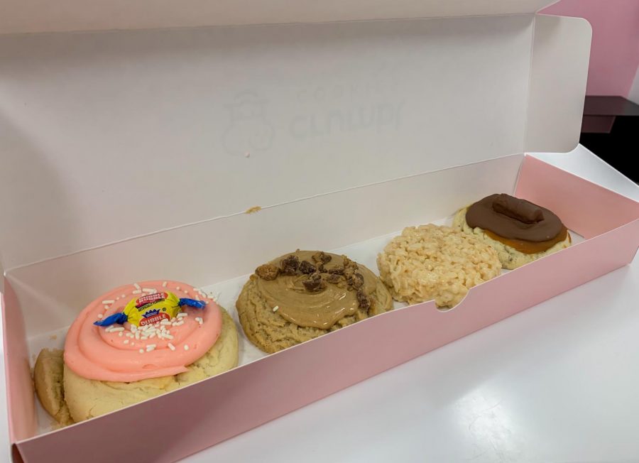 Crumbl+introduces+new+flavors+each+week.+The+four+new+flavors+this+week+are+Sugar+featuring+Twix%2C+Bubble+Gum%2C+Peanut+Butter+Cup+featuring+Reese%E2%80%99s+and+Classic+Krispy+Bar.