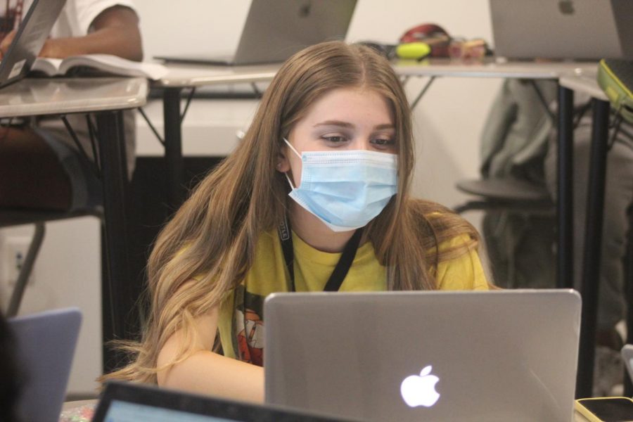 MSD student works on class assignment while wearing their facial covering during class. After a meeting on Oct. 26, BCPS has changed high schools policies on mask to be mask-optional for all students, teachers, administration and staff.