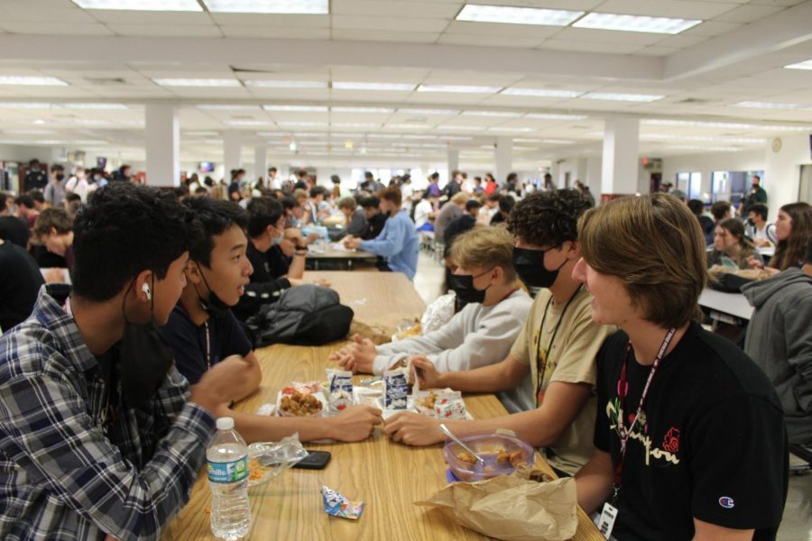 On the right side, in the middle, sophomore Matthew Kaufman and and his friends can be found together during B lunch enjoying their freshly served lunches. In the cafeteria, other students like Kaufman can be found chowing down and laughing.
