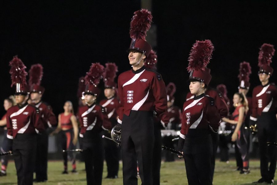 The Eagle Regiment marching band performs at the homecoming game on Sept. 17. They presented their show, “Trés Opulent,” in front of a packed audience.