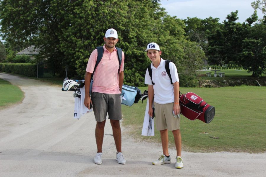 Starting off the season strong. Devan Chahal and Dylan Marrone pose for a picture when walking between holes during a match.