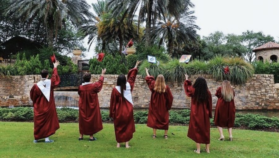 Looking to the future. MSD alumni students Alex Moscou, Jared Block, Katrina White, Fallon Trachtman and Ruby Harris throw their caps into the air to symbolize their high school graduation and new college life path.