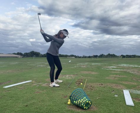 Junior Cynthia Liu practices daily at a local golf center to perfect her swings; she plans to continue golfing after graduating high school.