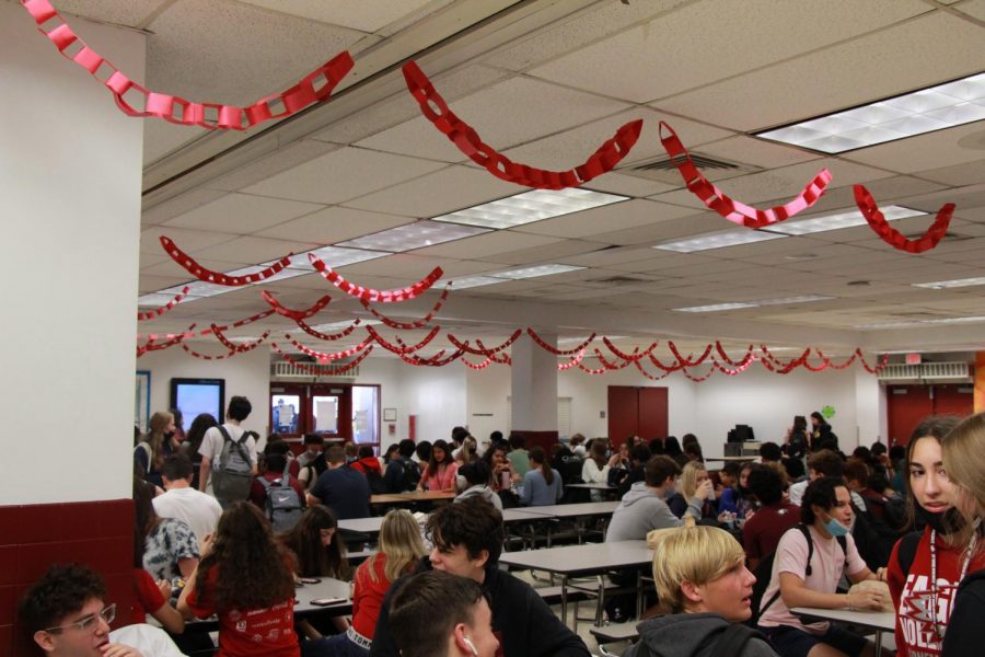 To raise awareness for the Red Ribbon initiative, peer counselors visited classrooms and had students write their names on pieces of red paper, which they attached and strung throughout the cafeteria.