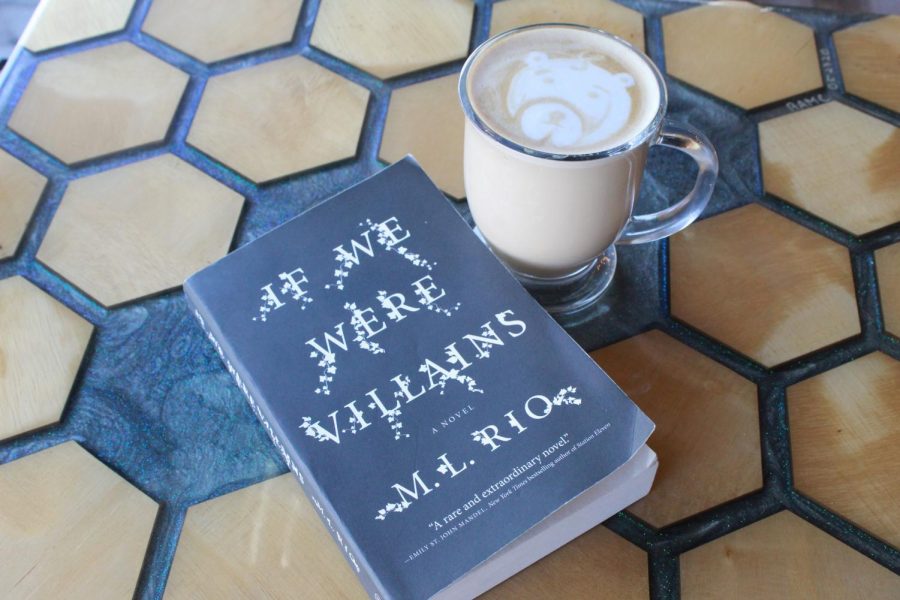 Sip a latte and enjoy If We Were Villains a riveting mystery thriller, written by M.L. Rio.