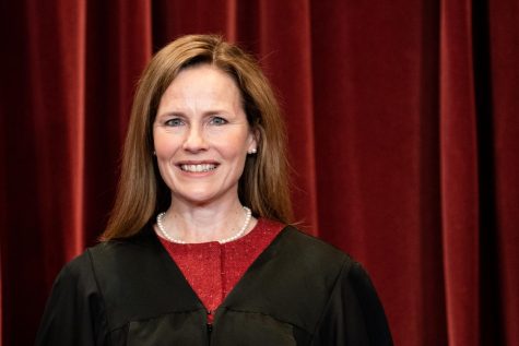 Associate Justice Amy Coney Barrett stands during a group photo of the Justices at the Supreme Court in Washington, D.C. (Erin Schaff/Pool/Getty Images/TNS)