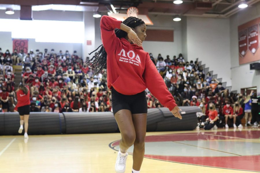 Pep in Her Step. Senior Layla Ali performs alongside the MSD step team in the freshmen and sophomore pep rally on Friday, Sept. 17, 2021, First inspired to join the step team by her mom, Ali is now the captain of the team. 