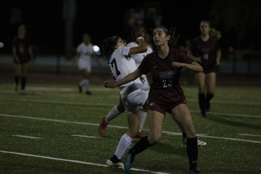Midfielder and forward Alexis Reigel (23) keeps her eye on the ball in their matchup against J.P. Taravella on Jan. 27. The game ended in favor of the Lady Eagles with a score of 5-0.