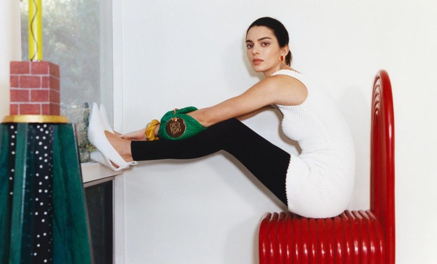 Kendall+Jenner+awkwardly+poses+for+the+March+edition+magazine+of+Vogue.+She+sits+on+a+furnace+in+a+hunched-over+position+with+a+blank+face.+Photo+courtesy+of+Vogue.com