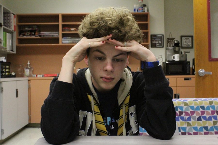 Photo illustartion of Sophomore Darryn Pomerantz-Duffy struggling with stress and anxiety from taking AP Computer Science.