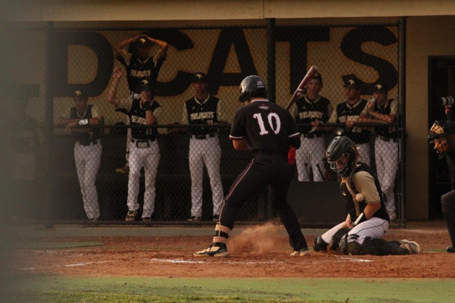 First baseman Christian Rodriguez (10) loads out of his batting stance to let the grounded pitch by. Rodriguez grabbed two hits during the game, contributing towards the Eagles' 14-8 victory.