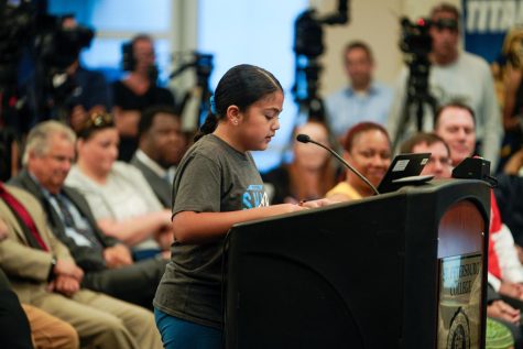Zoe Sanchez, 9, a student at SouthShore Charter Academy School, makes remarks on behalf of her school during a meeting Wednesday of Floridas State Board of Education, held at St. Petersburg College Seminole Campus. “I cannot say enough how much I love my school,” she told board members. Courtesy of Martha Asencio-Rhine/TNS.