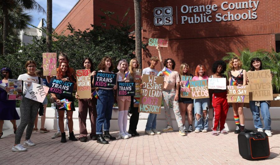 Students hold a rally outside a Orange County School Board meeting, on Tuesday, May 24, 2022. A student group based at Winter Park High and a local group opposed to book bans are holding a rally outside the Orange County School Board office. They are rallying against state laws. Courtesy of Ricardo Ramirez Buxeda/Orlando Sentinel/Tribune News Service.
