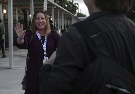Lori Alhadeff, School Board member and mother of a Parkland school shooting victim, greets students Tuesday at Coral Glades High School in Coral Springs. (Photo Courtesy of Joe Cavaretta/TNS)