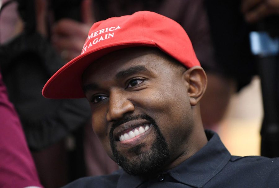 Kanye+West+looks+on+in+the+Oval+Office+of+the+White+House+during+a+meeting+with+President+Donald+Trump+on+Oct.+11%2C+2018%2C+in+Washington%2C+D.C.+Wests+long+list+of+business+partners+again+face+a+choice%3A+stick+with+him+or+finally+cut+ties+with+the+music+superstar.+Photo+courtesy+of+Olivier+Douliery%2FAbaca+Press%2FTNS.