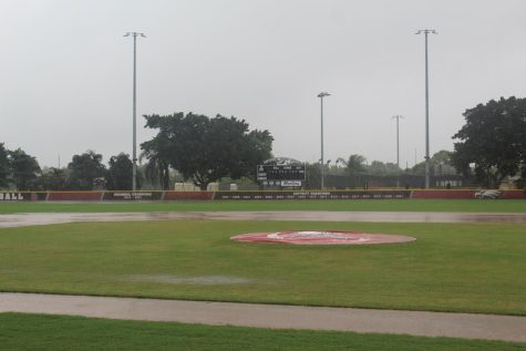The MSD baseball field soaks with rain as Hurrican Ian passes over Parkland. Safety precautions and flooded fields led to the cancelation of baseball practices and games.